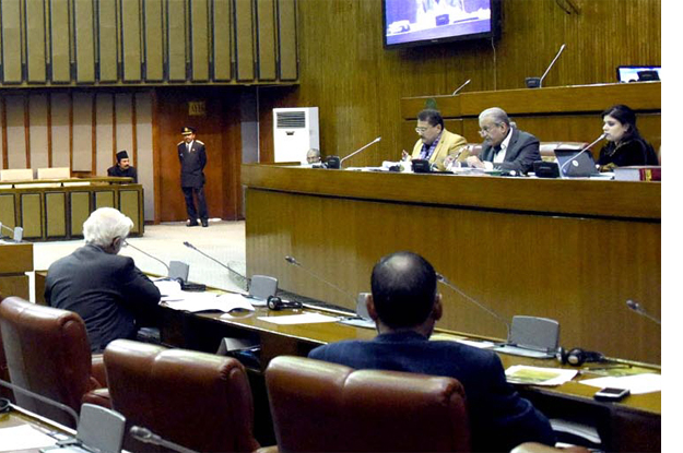 chairman senate mian raza rabbani presiding over a meeting of the committee of the whole at parliament house photo inp