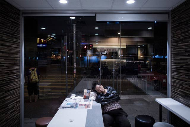 a woman sleeping at a mcdonald s restaurant in hong kong in october across east asia 24 hour mcdonald 039 s have become a sanctuary for the downtrodden providing a warm dry place to sleep photo lam yik fei a woman sleeping at a mcdonald s restaurant in hong kong in october across east asia 24 hour mcdonald 039 s have become a sanctuary for the downtrodden providing a warm dry place to sleep photo lam yik fei