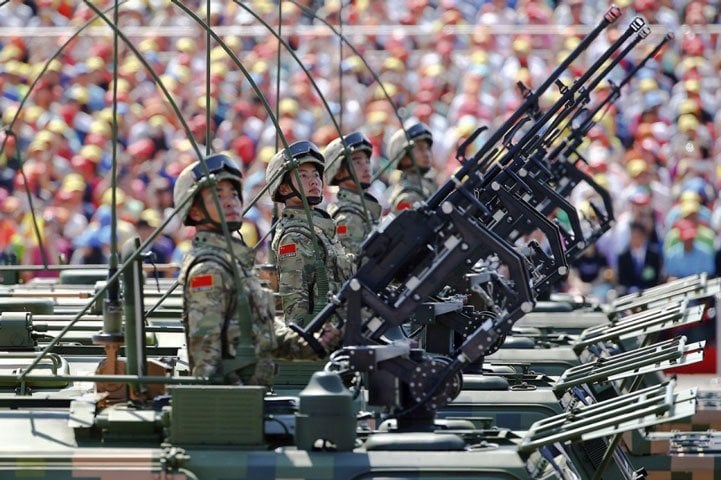 china 039 s people 039 s liberation army soldiers move through the square on tanks photo reuters