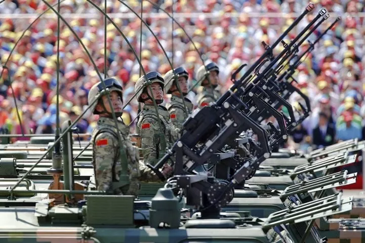 china 039 s people 039 s liberation army soldiers move through the square on tanks photo reuters china 039 s people 039 s liberation army soldiers move through the square on tanks photo reuters