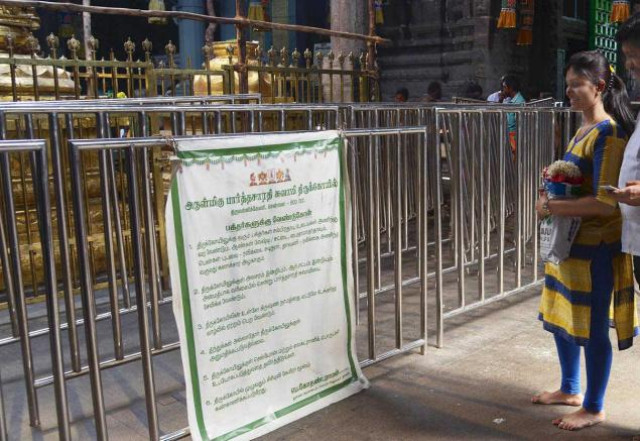 a banner about the dress code for devotees put up at sri parthasarathy swamy temple at triplicane in chennai photo courtesy the hindu a banner about the dress code for devotees put up at sri parthasarathy swamy temple at triplicane in chennai photo courtesy the hindu