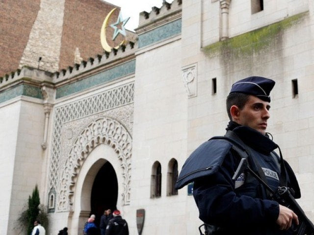 in this file photo police personnel guard a mosque in paris photo reuters in this file photo police personnel guard a mosque in paris photo reuters