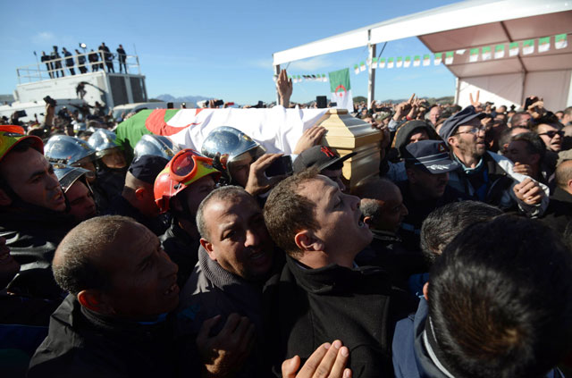 algerian firemen carry the coffin of hocine ait ahmed one of the fathers of the country 039 s struggle for independence and a key opposition figure during his funeral procession in the algerian village of ait ahmed on january 1 2016 photo afp