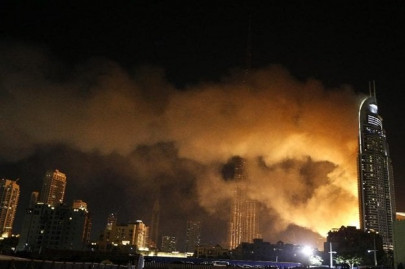 thrilling start to 2016 man survives dubai fire after hanging from balcony