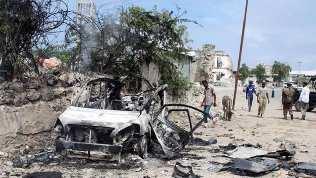 the scene in mogadishu on august 31 2014 following a car bomb and gun attack photo afp