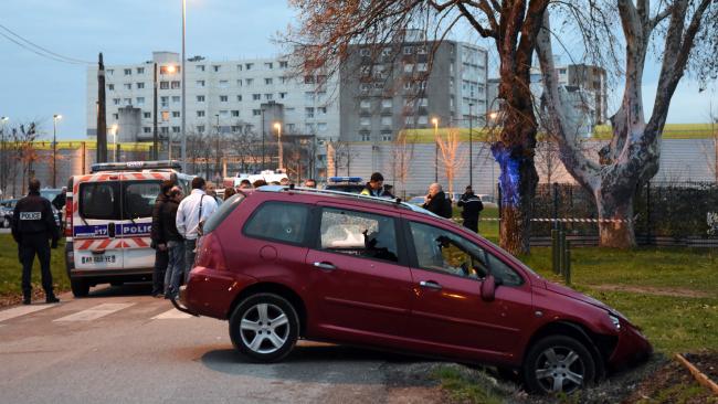 french police stand near a red car in front of the mosque in valence photo afp