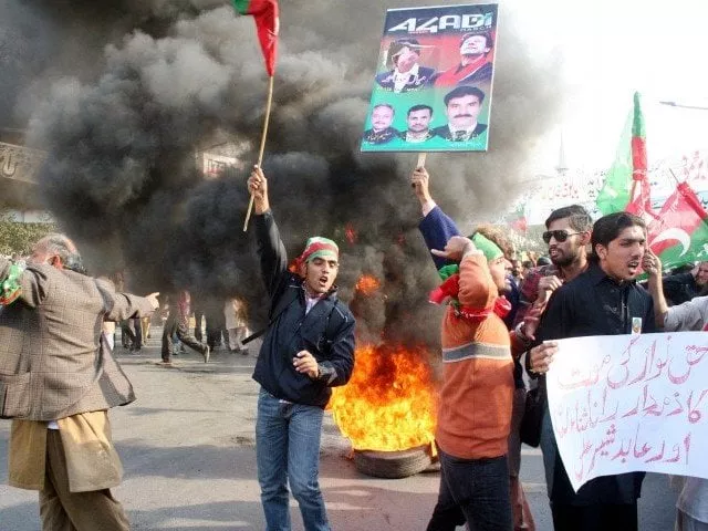 this file photo shows pti supporters protesting after the death of pti activist haq nawaz photo ppi this file photo shows pti supporters protesting after the death of pti activist haq nawaz photo ppi