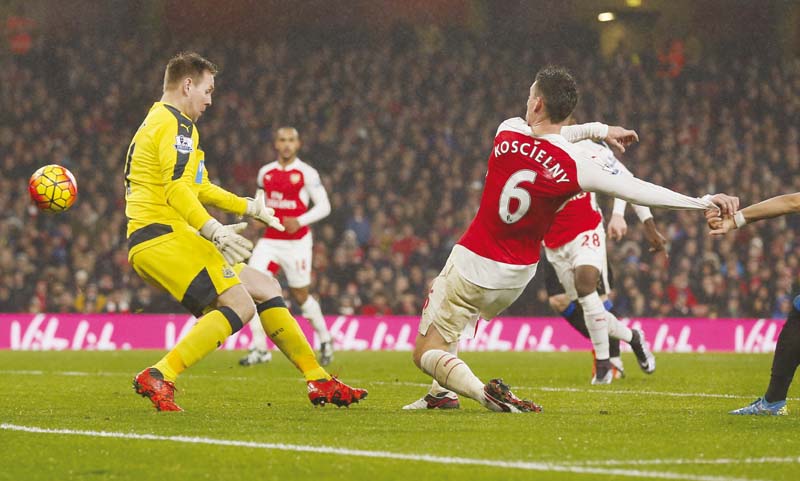 centre back koscielny provided a striker s finish to score the only goal of the match against newcastle photo reuters