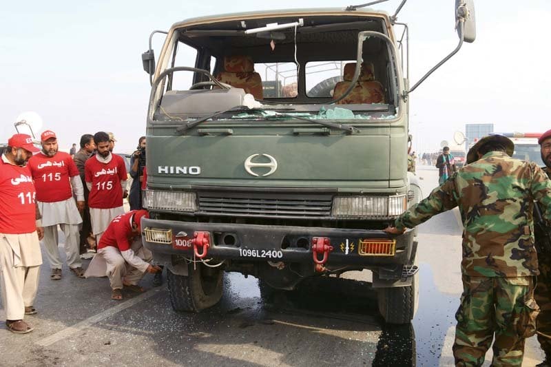 law enforcement personnel inspecting the site of the attack in city photos muhammad iqbal express