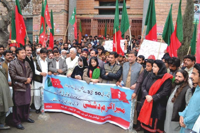 members of national party hold a protest demonstration outside the quetta press club photo express members of national party hold a protest demonstration outside the quetta press club photo express