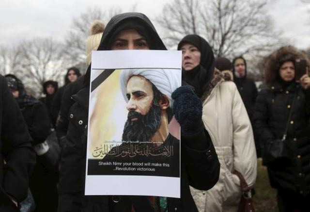 a muslim american protests against the execution of shia muslim cleric nimr al nimr in saudi arabia during a rally in dearborn michigan january 3 2016 photo reuters a muslim american protests against the execution of shia muslim cleric nimr al nimr in saudi arabia during a rally in dearborn michigan january 3 2016 photo reuters