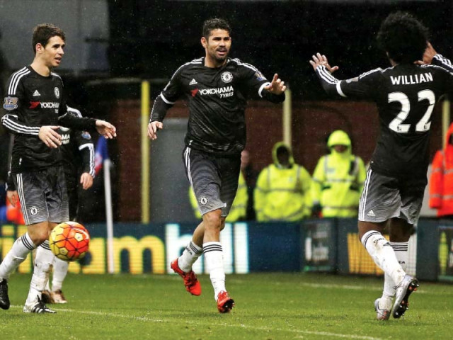 willian costa and oscar found the net as chelsea overpowered palace at a rain lashed selhurst park to register their first win under interim manager hiddink photo afp willian costa and oscar found the net as chelsea overpowered palace at a rain lashed selhurst park to register their first win under interim manager hiddink photo afp