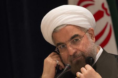 cutting off heads no response to criticism iran s rouhani