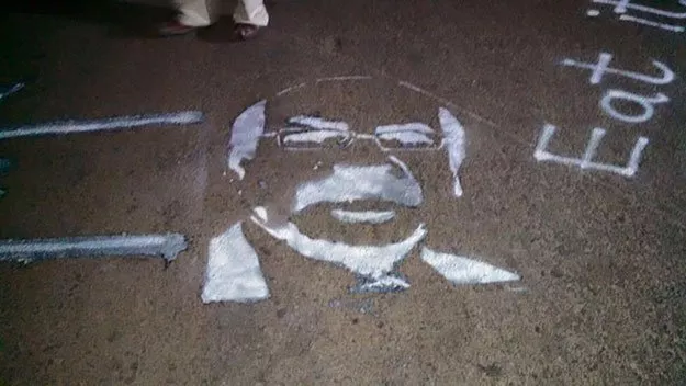 the team spray painted sindh chief minister qaim ali shah s face on the roads to bring attention to unattended issues around the city photo facebook the team spray painted sindh chief minister qaim ali shah s face on the roads to bring attention to unattended issues around the city photo facebook