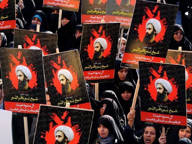 iranian women gather during a demonstration against the execution of prominent shia muslim cleric nimr al nimr portrait by saudi authorities at imam hossein square in the capital tehran on january 4 2016 photo afp