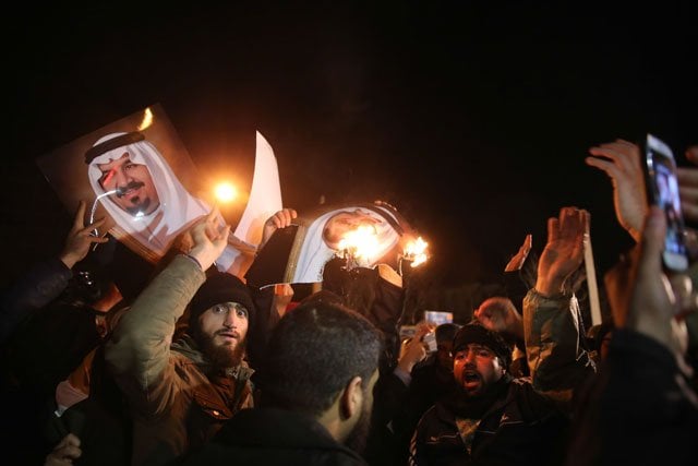 iranian protesters gather outside the saudi embassy in tehran during a demonstration against the execution of prominent shia cleric nimr al nimr by saudi authorities on january 2 2016 photo afp