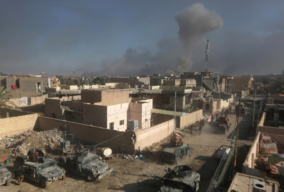 smoke billows following a reported air strike by the us led coalition on december 29 2015 on the outskirts of ramadi photo afp