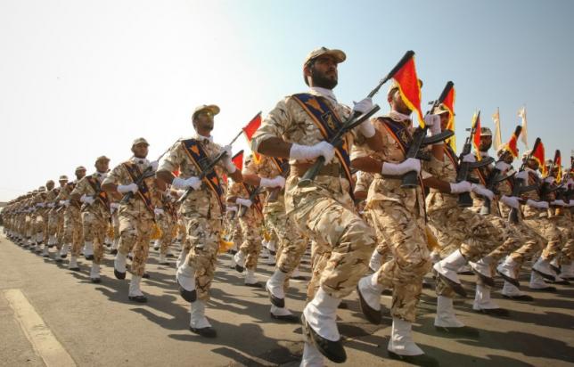 members of the iranian revolutionary guard march during a parade to commemorate the anniversary of the iran iraq war 1980 88 in tehran september 22 2011 photo reuters