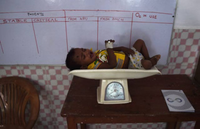 as population soars india battles to tame malnutrition