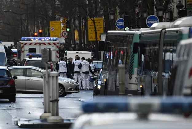 rescue workers are seen at the boulevard de barbes in the north of paris on january 7 2016 after police shot a man dead as he was trying to enter a police station in the rue de la goutte d 039 or photo afp rescue workers are seen at the boulevard de barbes in the north of paris on january 7 2016 after police shot a man dead as he was trying to enter a police station in the rue de la goutte d 039 or photo afp