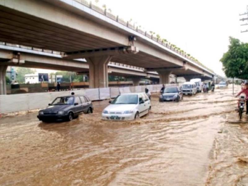 vehicles struggle to move along the flooded muree road in rawalpindi photo file