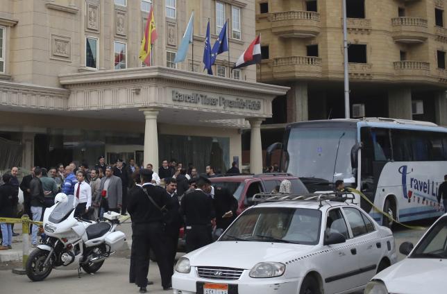 police are seen at the scene where gunmen attacked a tourist bus in front of a hotel in giza greater cairo egypt on january 7 2016 photo reuters