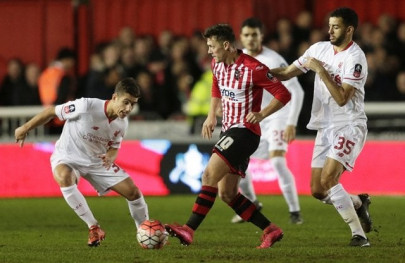 liverpool survive exeter scare to spare bogdan s blushes liverpool survive exeter scare to spare bogdan s blushes