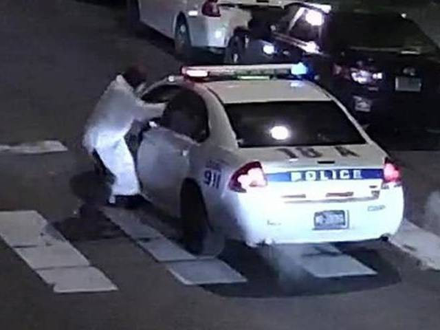 this image obtained january 8 2016 from the philadelphia police department shows a suspect shooting into a police car on january 7 2016 photo afp this image obtained january 8 2016 from the philadelphia police department shows a suspect shooting into a police car on january 7 2016 photo afp