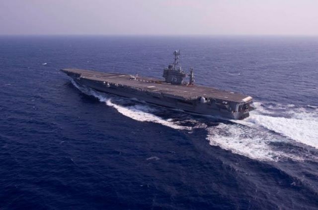 the aircraft carrier uss harry s truman performs a full power run during sea trials in the atlantic ocean in this july 8 2012 handout photo courtesy of the us navy photo reuters