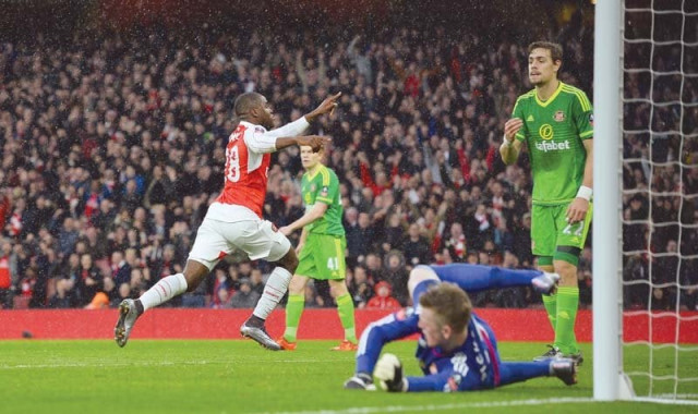 goals from campbell ramsey and giroud were enough to see the gunners through after sunderland had taken a surprise lead through lens photo afp goals from campbell ramsey and giroud were enough to see the gunners through after sunderland had taken a surprise lead through lens photo afp