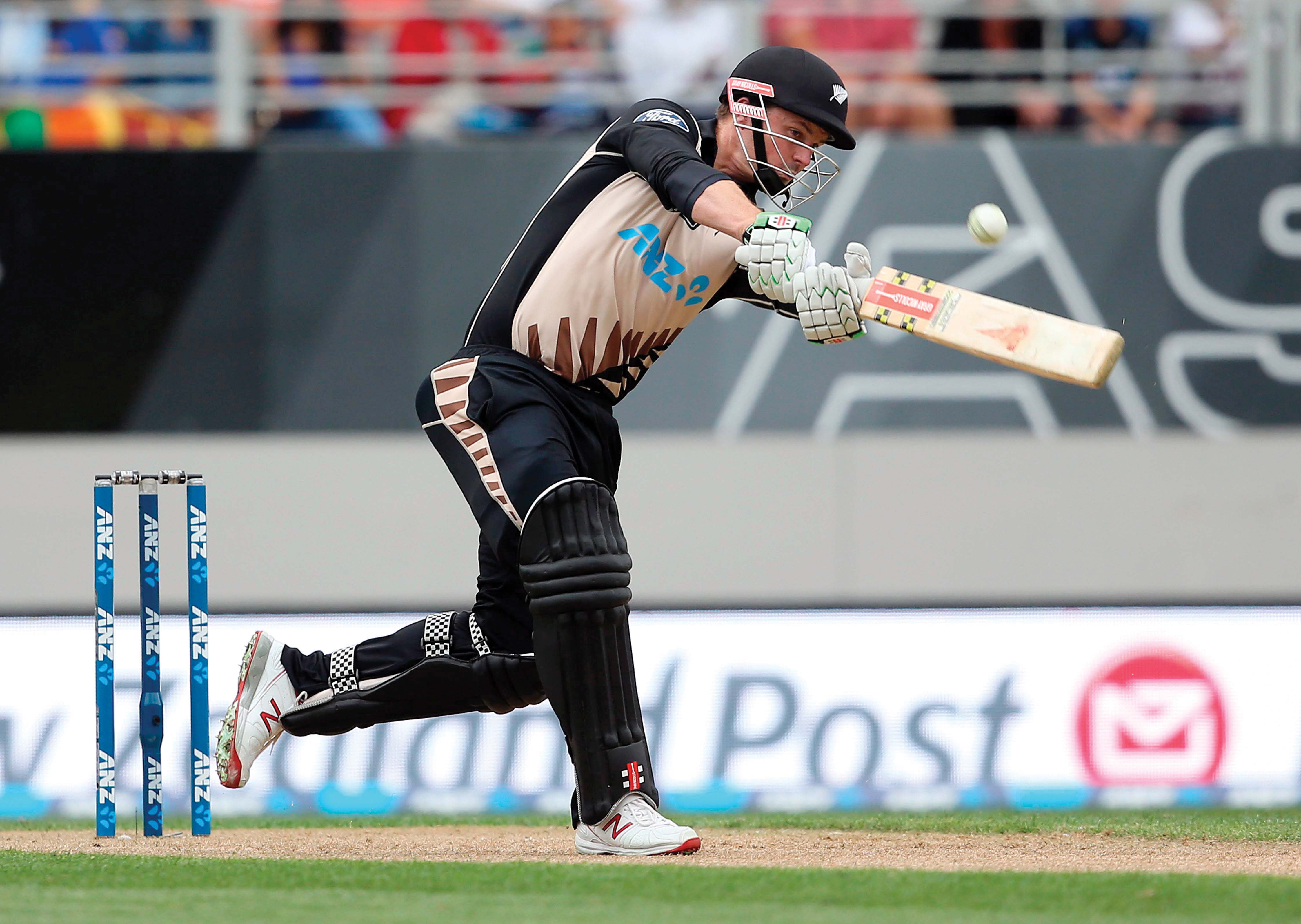 munro blasted new zealand s fastest t20i half century off 14 balls to surpass a mark set by guptill earlier in the innings off 19 balls photo afp
