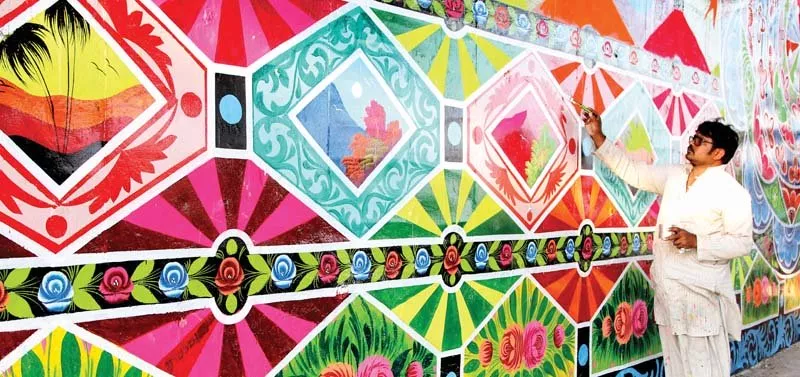 truck artists from phool patti are working on giving a revamp to the karsaz flyover on sharae faisal they will finish with the project by january 15 photo aysha saleem express truck artists from phool patti are working on giving a revamp to the karsaz flyover on sharae faisal they will finish with the project by january 15 photo aysha saleem express