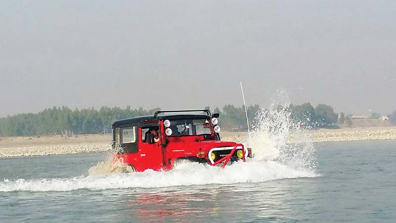 jeeps at a water cross event in swabi photos express