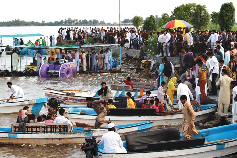 a number of residents of the twin cities throng the lake to enjoy motor boat rides oblivious to the polluting effect of the activity on the water supply from the lake to rawalpindi residents photo file