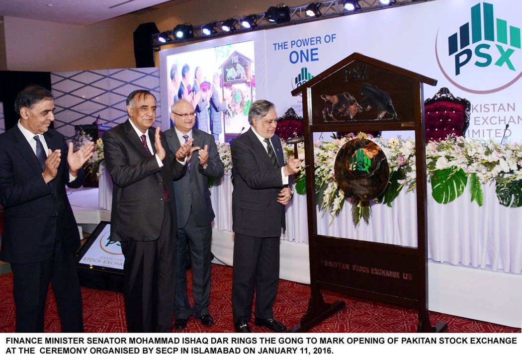 finance minister ishaq dar rings the gong to mark the opening of pakistan stock exchange in islamabad on january 11 2016 photo pid