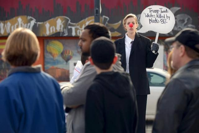 megan kosmides of reno nevada takes part in a silent protest against us republican presidential candidate donald trump outside of the reno event center where trump spoke on january 10 2016 photo reuters megan kosmides of reno nevada takes part in a silent protest against us republican presidential candidate donald trump outside of the reno event center where trump spoke on january 10 2016 photo reuters