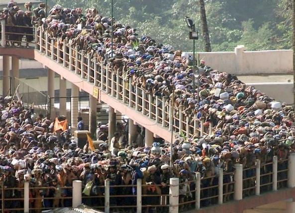 hindu pilgrims queue outside the sabarimala temple to offer prayers to the hindu deity 039 ayappa 039 about 70 kms west of the town pathanamthtta in kerala on january 15 2003 photo reuters