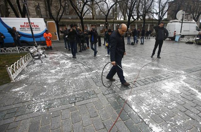 a municipality worker cleans the site of tuesday 039 s suicide bomb attack at sultanahmet square in istanbul turkey january 13 2016 photo reuters