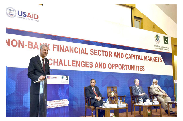 state bank of pakistan sbp governor ashraf wathra speaking at a conference on non bank financial sector and capital markets organised by secp and usaid photo app