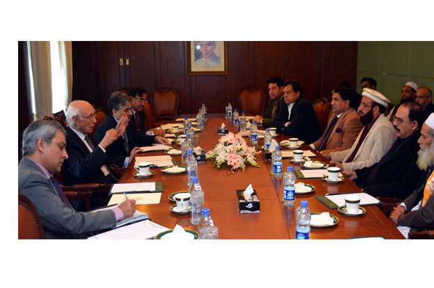 federal minister for religious affairs and leader of the parliamentarian s delegation sardar muhammad yousaf in a meeting with adviser to prime minister on foreign affairs sartaj aziz photo inp