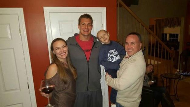 dorian and his family with new england patriot rob gronkowski family photo via wpri