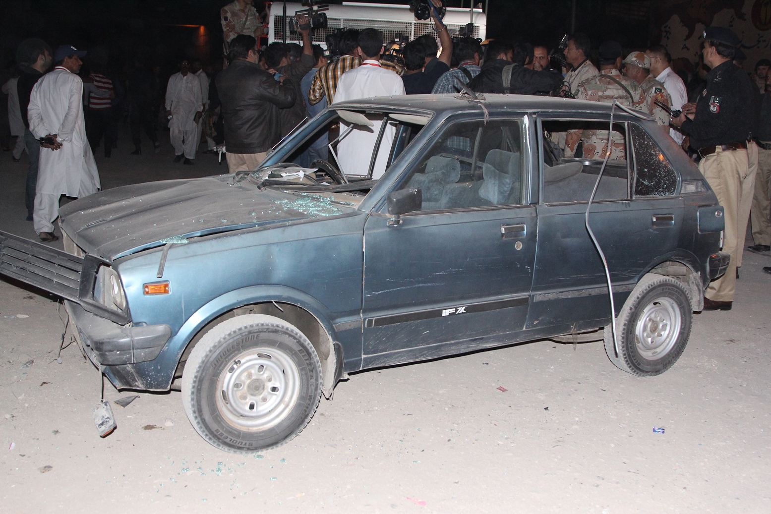 car damaged as a result of the manhole explosion in karachi on january 14 2015 photo ayesha saleem express