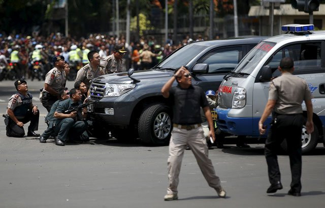 police officers react near the site of a blast in jakarta indonesia on january 14 2016 photo reuters police officers react near the site of a blast in jakarta indonesia on january 14 2016 photo reuters