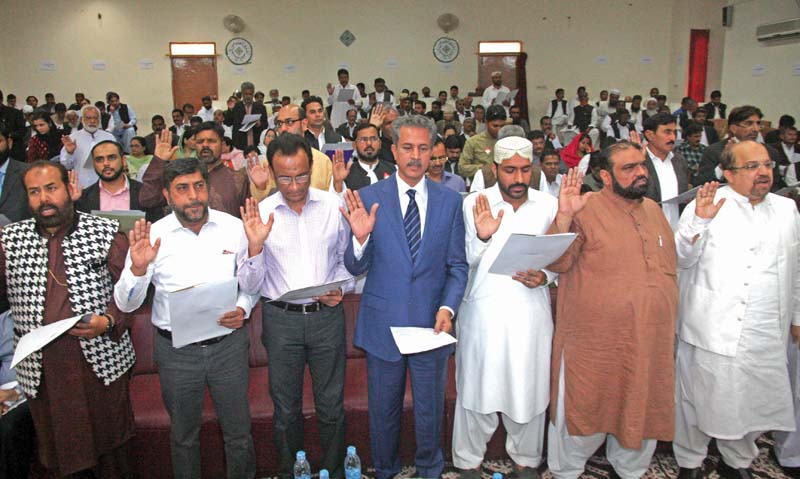 mayor nominee wasim akhtar and other lg representatives took oath at federal urdu university on thursday photo athar khan express