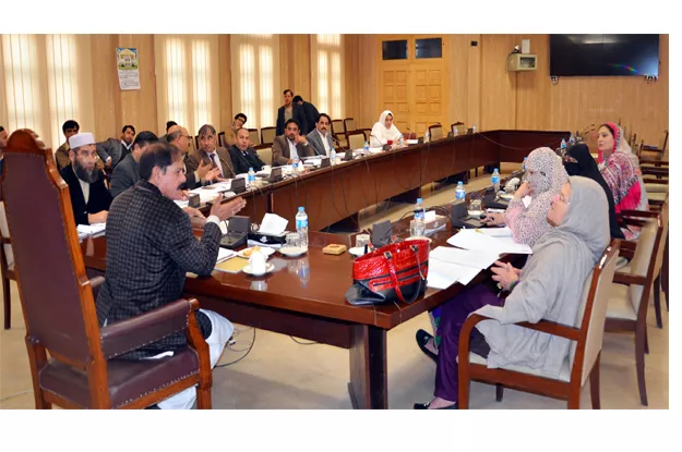 special adviser to the chief minister on information and higher education presiding over a meeting of special committee photo express special adviser to the chief minister on information and higher education presiding over a meeting of special committee photo express