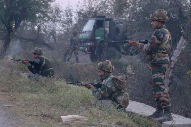 indian army personnel stand alert near the air force base in pathankot on january 2 2016 during an ongoing attack on the base by suspected militants photo afp