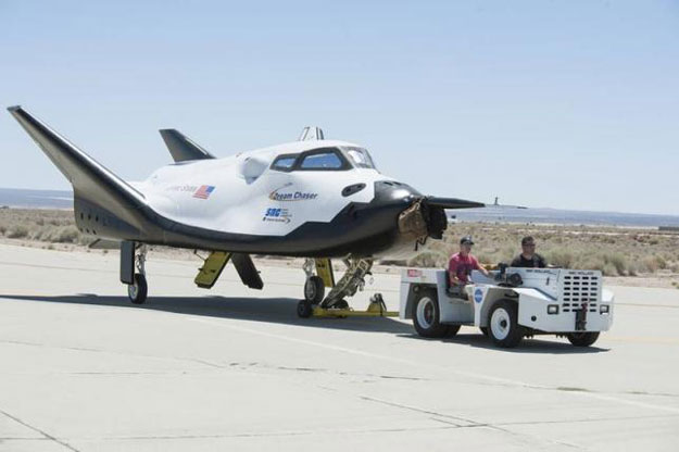 sierra nevada corporation engineers and technicians prepare the firm 039 s dream chaser engineering test vehicle for tow tests on a taxiway at nasa 039 s dryden flight research center in palmdale california on june 27 2013 photo reuters