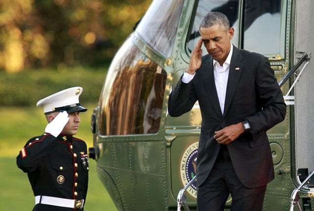 us president barack obama salutes as he steps off the marine one helicopter on the south lawn of the white house upon return to washington from louisiana on january 14 2016 photo reuters us president barack obama salutes as he steps off the marine one helicopter on the south lawn of the white house upon return to washington from louisiana on january 14 2016 photo reuters