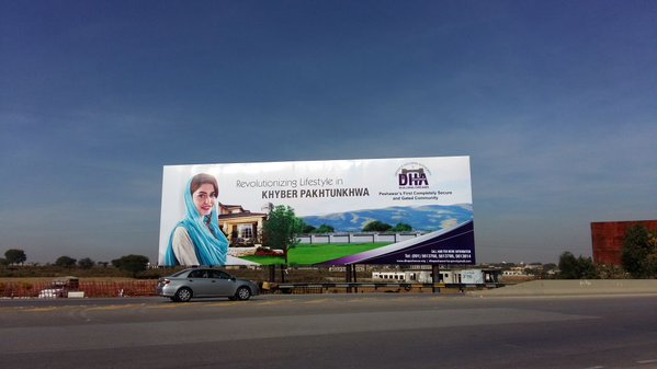 billboard of dha peshawar on islamabad peshawar motorway photo halima mansoor express