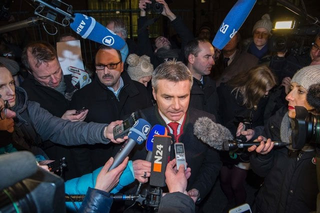 german bavarian landshut district administrator peter dreier speaks to reporters in front of the chancellery in berlin on january 14 2016 after he chartered a bus to take 31 refugees from the bavarian city of landshut to the chancellery photo afp german bavarian landshut district administrator peter dreier speaks to reporters in front of the chancellery in berlin on january 14 2016 after he chartered a bus to take 31 refugees from the bavarian city of landshut to the chancellery photo afp